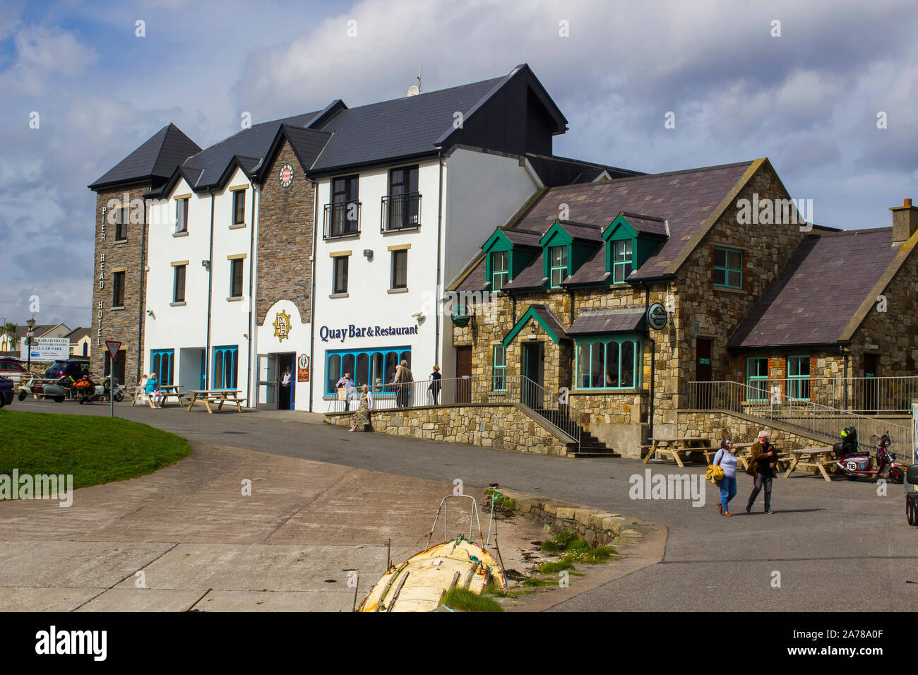 23 August 2019 Customers outside a small pub and restaurant in the harbour village of Mullaghmore County Sligo Ireland Stock Photo