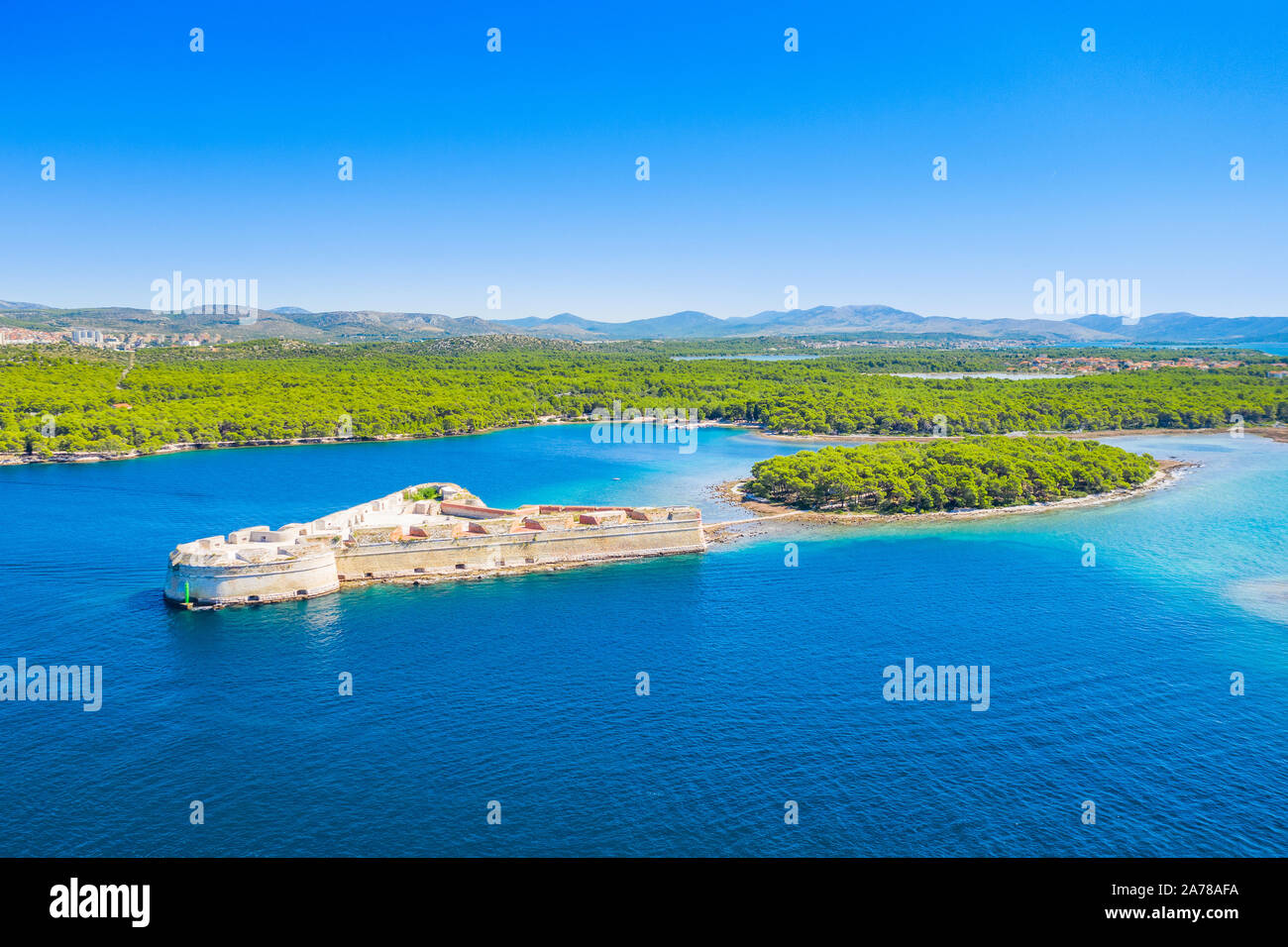 Old stone St. Nicholas fortress at Sibenik bay entrance, archipelago of Dalmatia, Croatia, drone aerial shot Stock Photo