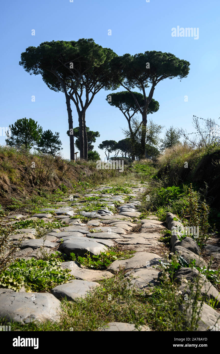 Rome. Italy. Parco degli Acquedotti, section of the ancient Roman road Via Latina. The Via Latina is 191 km long and goes from Porta Capena  in the Se Stock Photo
