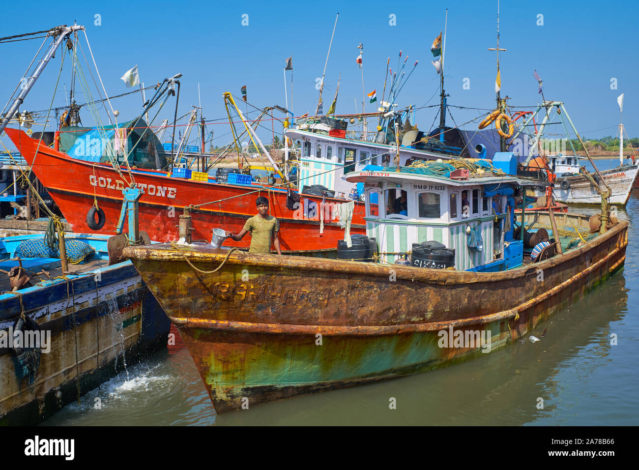 Small Colorful Fishing Boats In The The Old Harbor In Mangalore