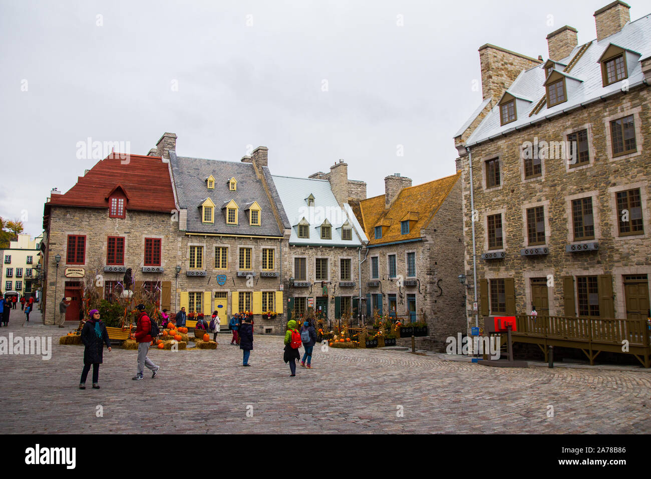 May 2019. Quartier du Petit Champlain, neighbourhood of Old Quebec City (Canada). Beautiful typical street. Square busy with few tourists. Stock Photo