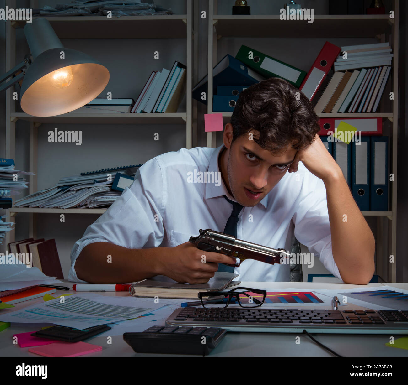 The man businessman working late hours in the office Stock Photo Alamy