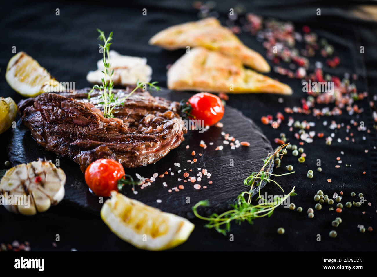 delicious rib eye steak with grilled vegetables & fresh spices Stock
