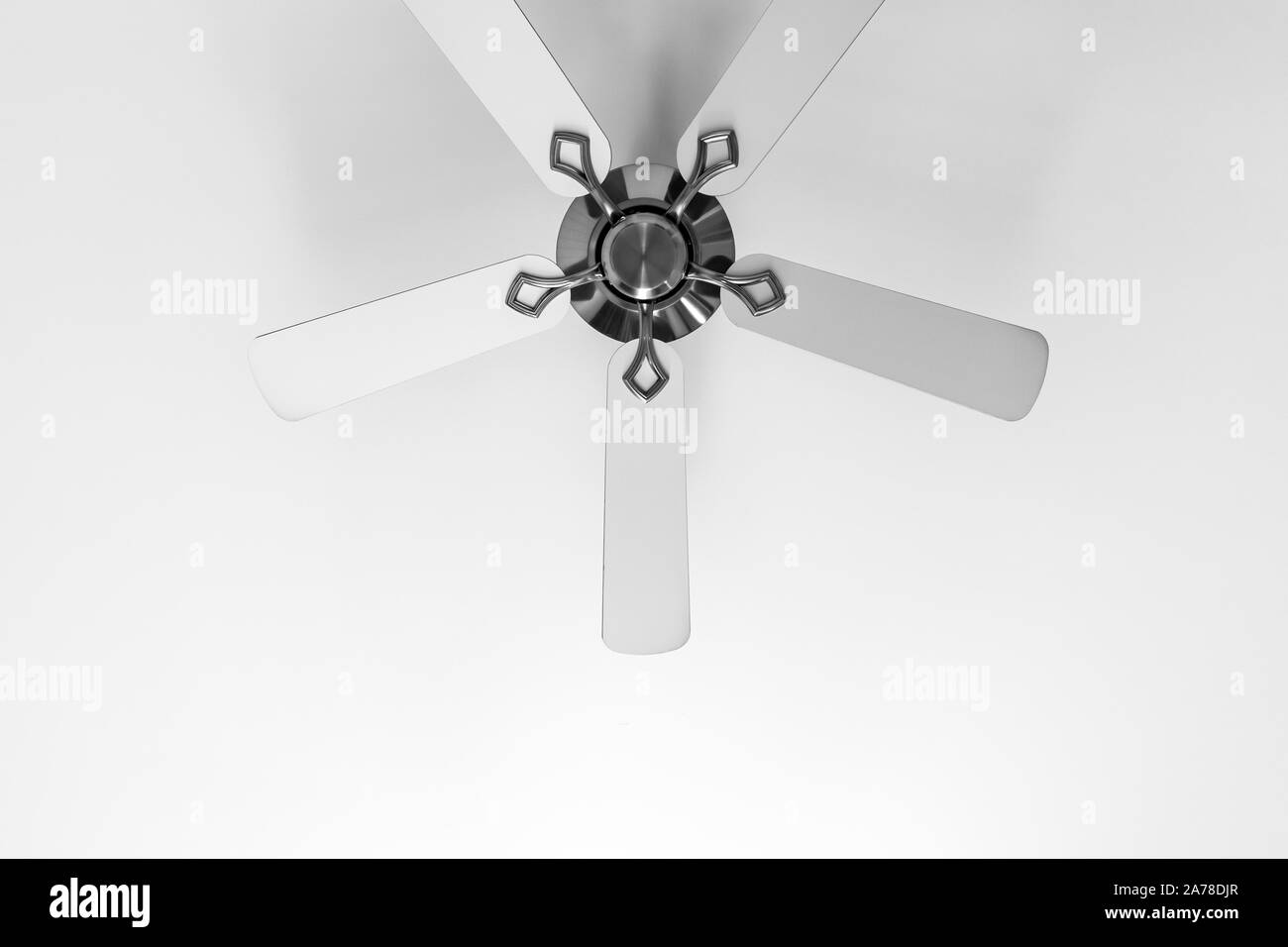 White ceiling fan fragment, close-up photo with soft shadow Stock Photo