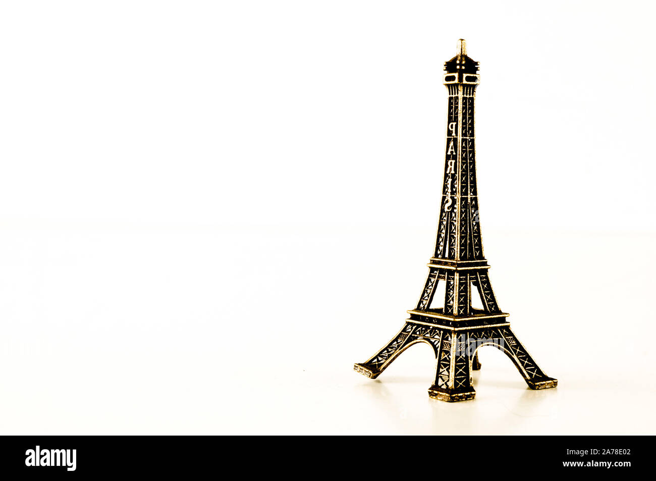 Eiffel Tower toy miniature on white background Stock Photo - Alamy