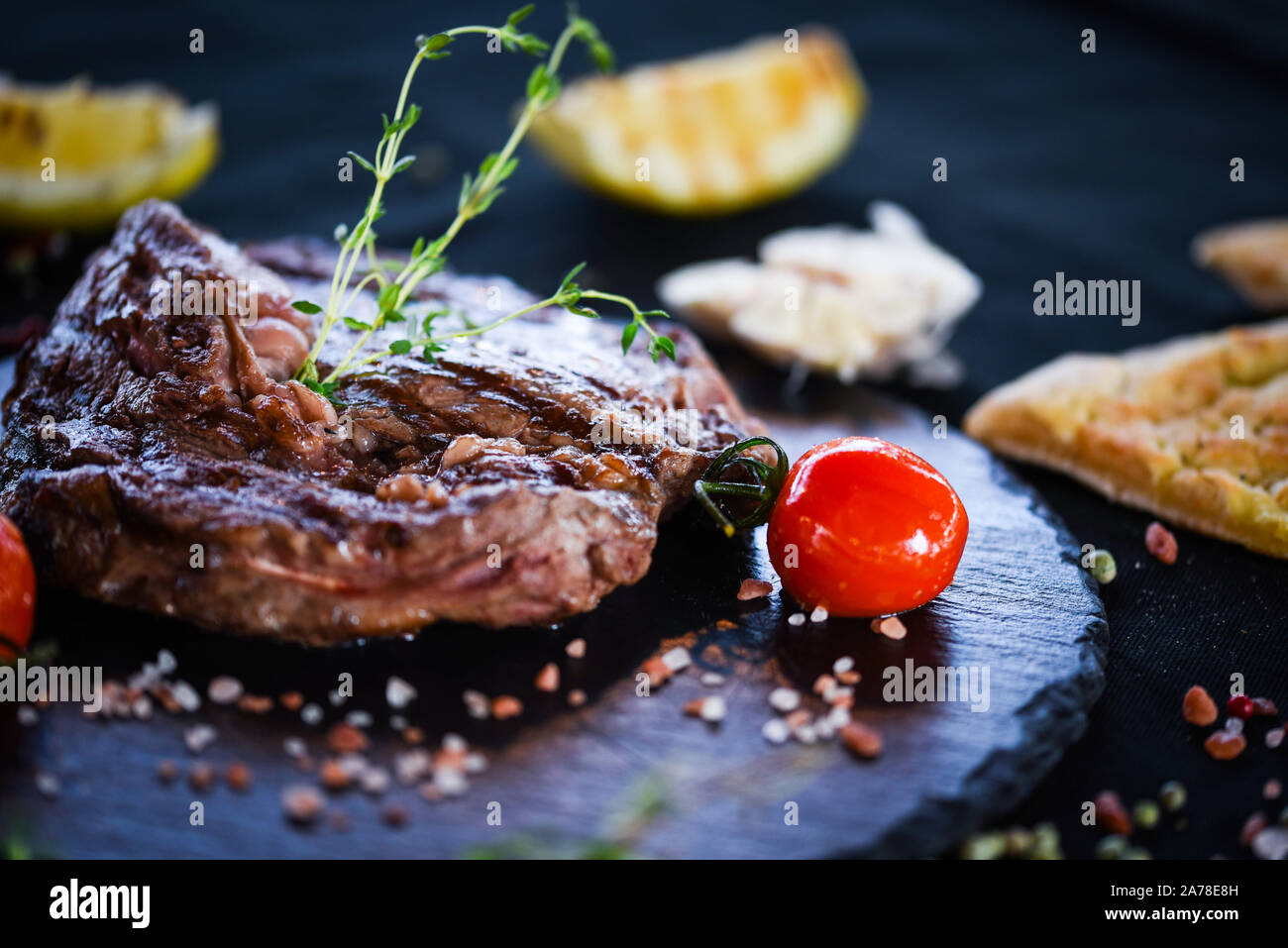 delicious rib eye steak with grilled vegetables & fresh spices Stock