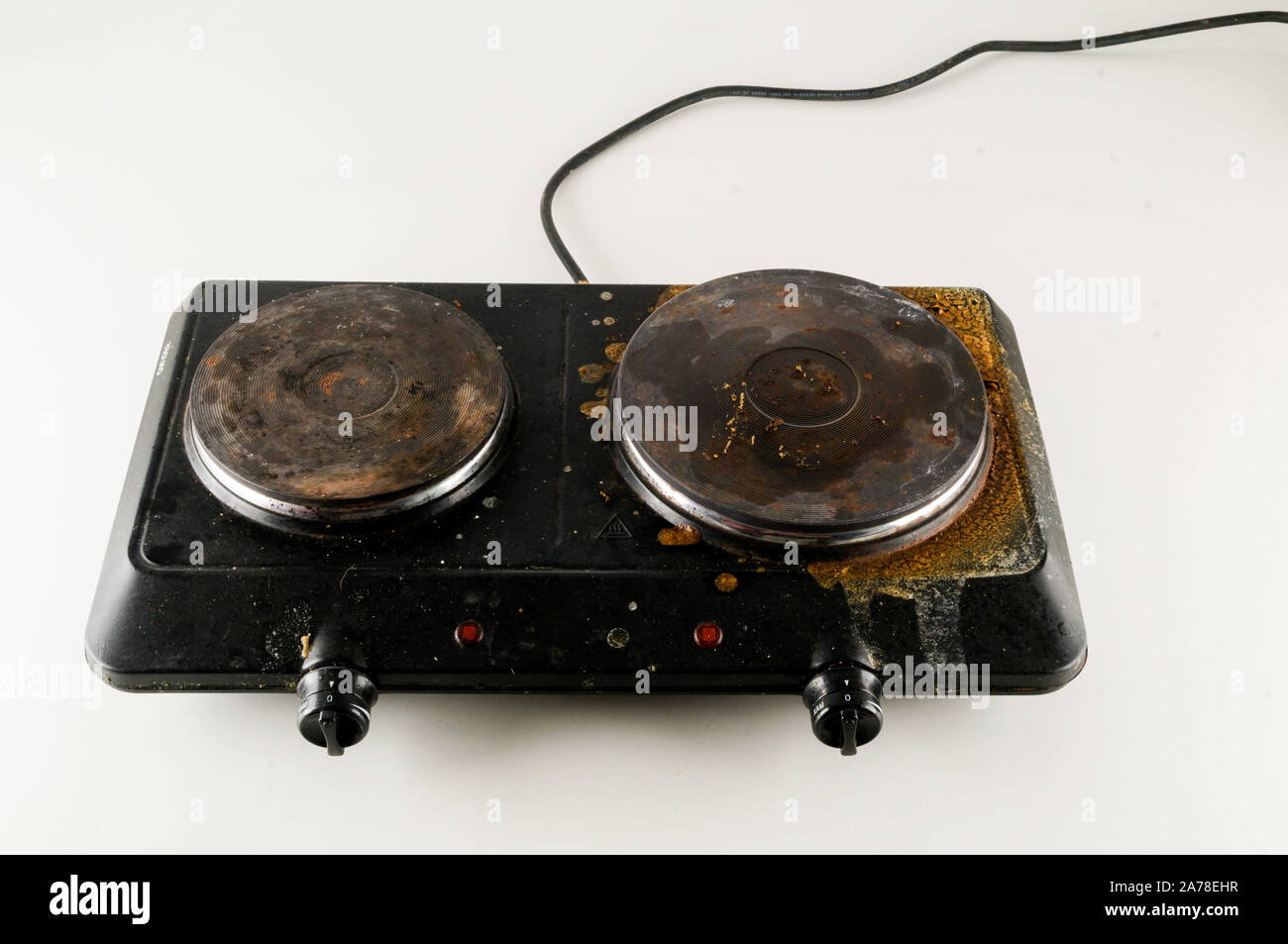 Black Portable electric cooker isolated on white background Stock Photo