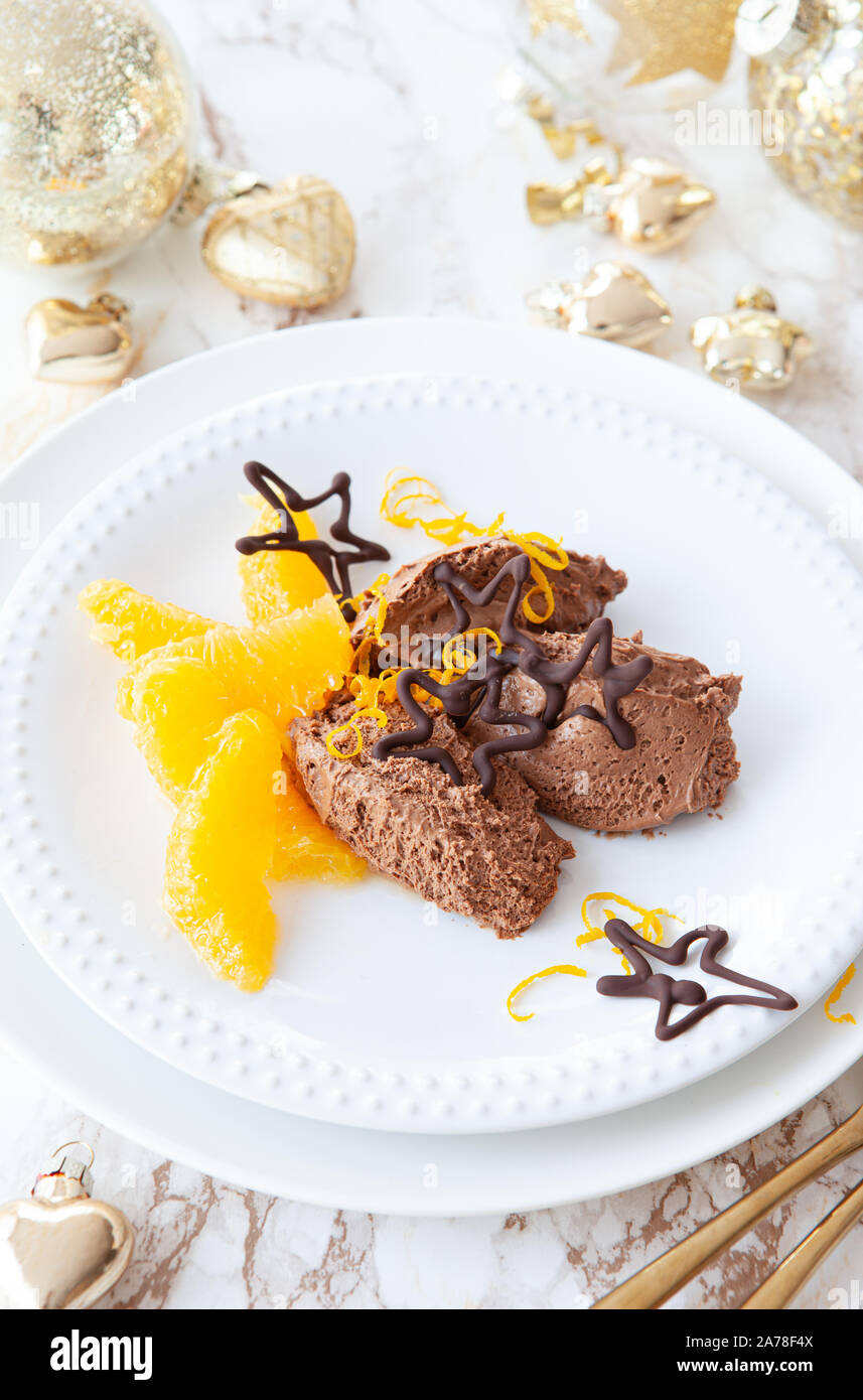 Chocolate mousse / mousse au chocolat with fresh orange slices Stock Photo