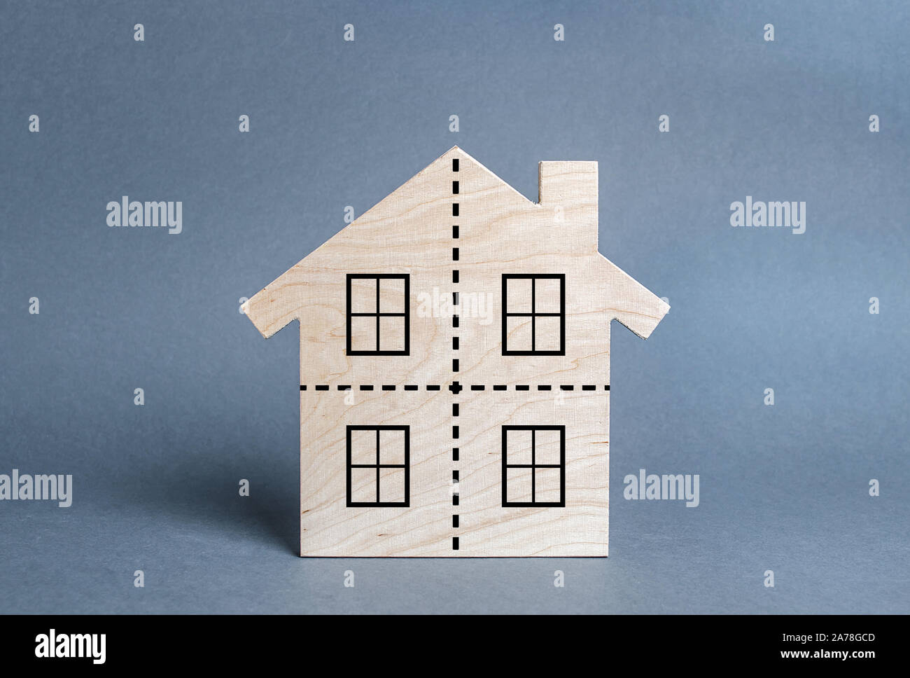 Residential building divided by a dotted line into four equal parts