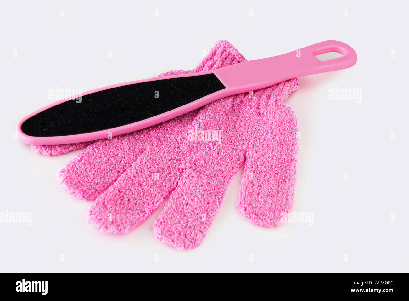 Foot file and massage gloves Stock Photo Alamy