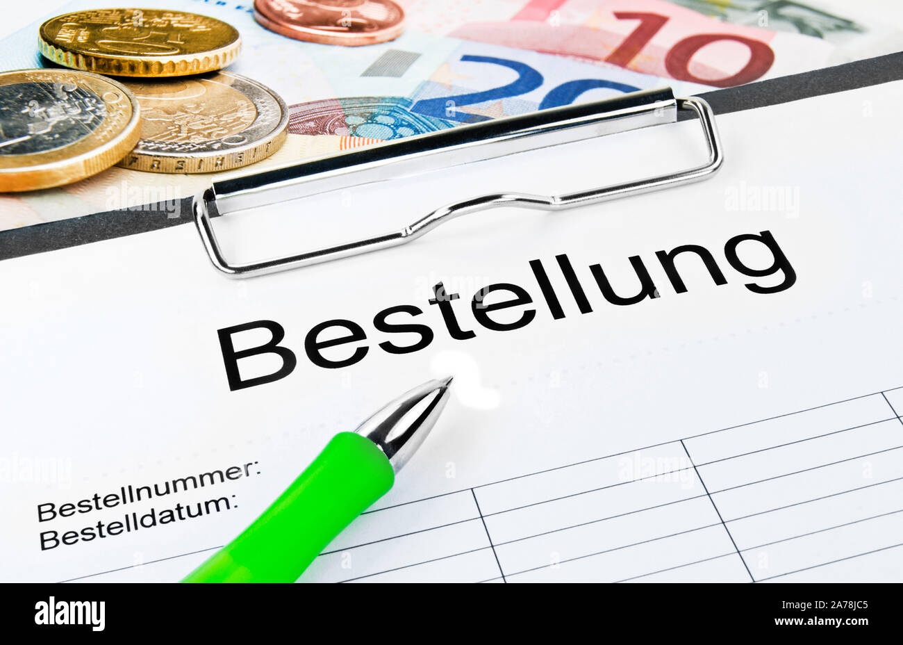 Order - Bestellung with Euro money Stock Photo
