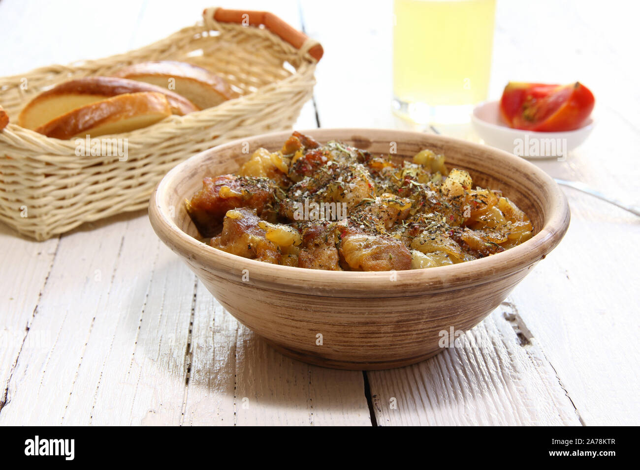 Braising meat with dry herbs and onions Stock Photo Alamy