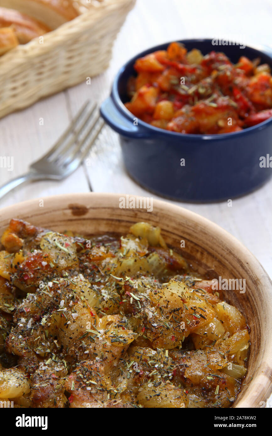 Braising meat with dry herbs and onions Stock Photo Alamy