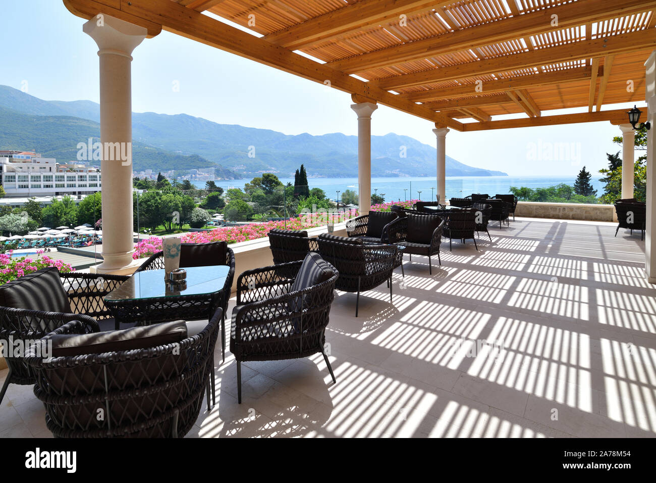 A Wicker chairs and table on the outdoor terrace Stock Photo - Alamy