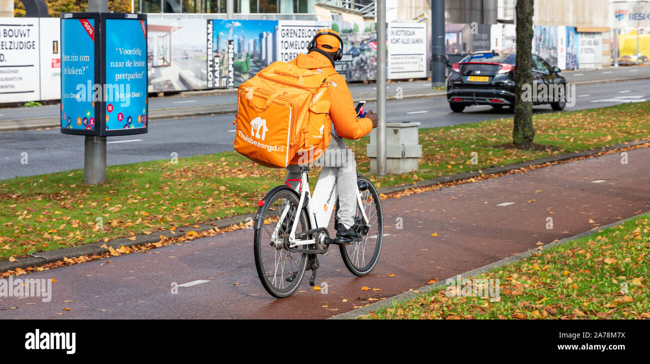 Rotterdam Netherlands, October 13, 2019. Food delivery. Rear view of a