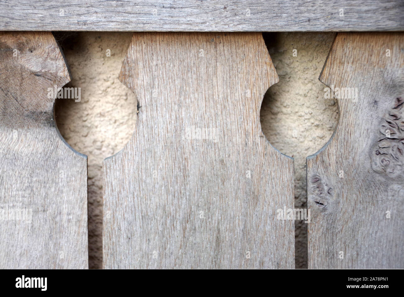 Detail of thistle cutouts on a bench at the doocot in the grounds of Dumfries House in Ayrshire. Stock Photo