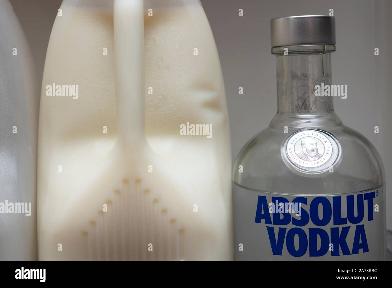 Absolut vodka and milk in a fridge Stock Photo