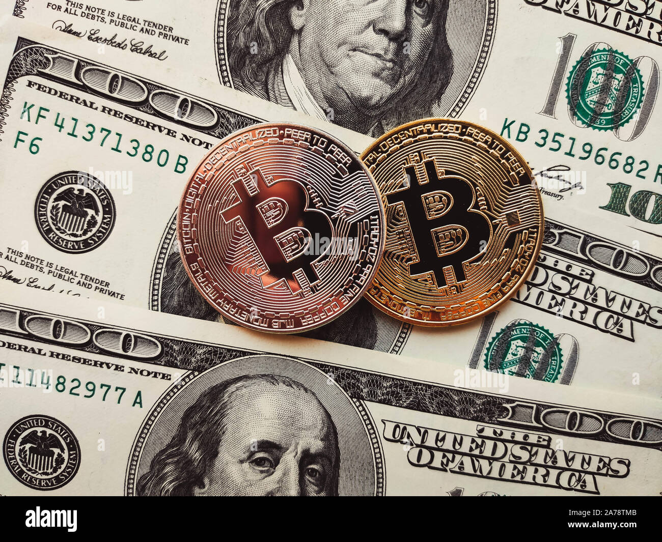 Bitcoin physical coins in US dollars. Digital currency Stock Photo - Alamy