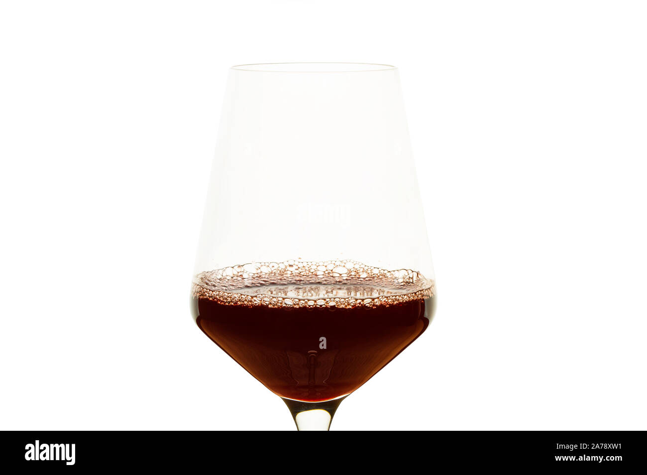 A glass of red wine on a white background Stock Photo - Alamy
