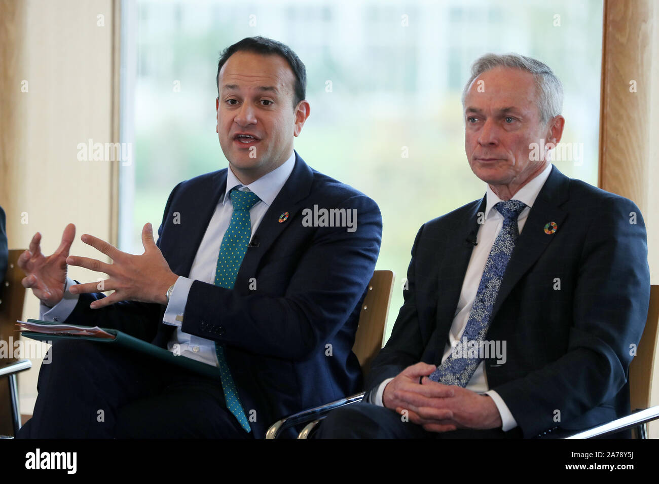 Taoiseach Leo Varadkar (left) and Minister for Climate Action & Environment Richard Bruton at the launch of the First Progress Report on the Climate Action Plan 2019 in the Botanic Gardens, Dublin. Stock Photo