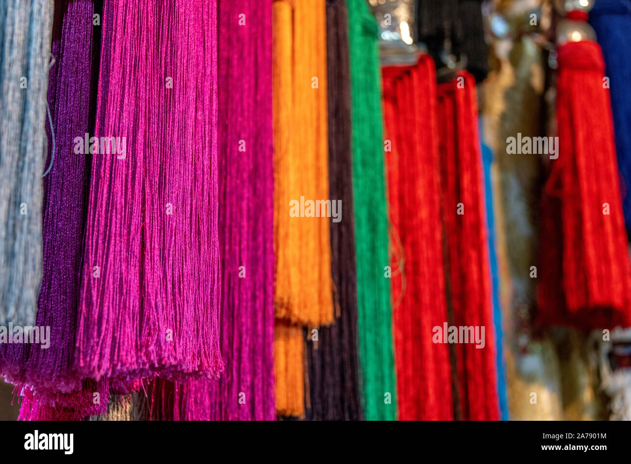 Colorful textiles hanging before being used for textiles Stock Photo ...