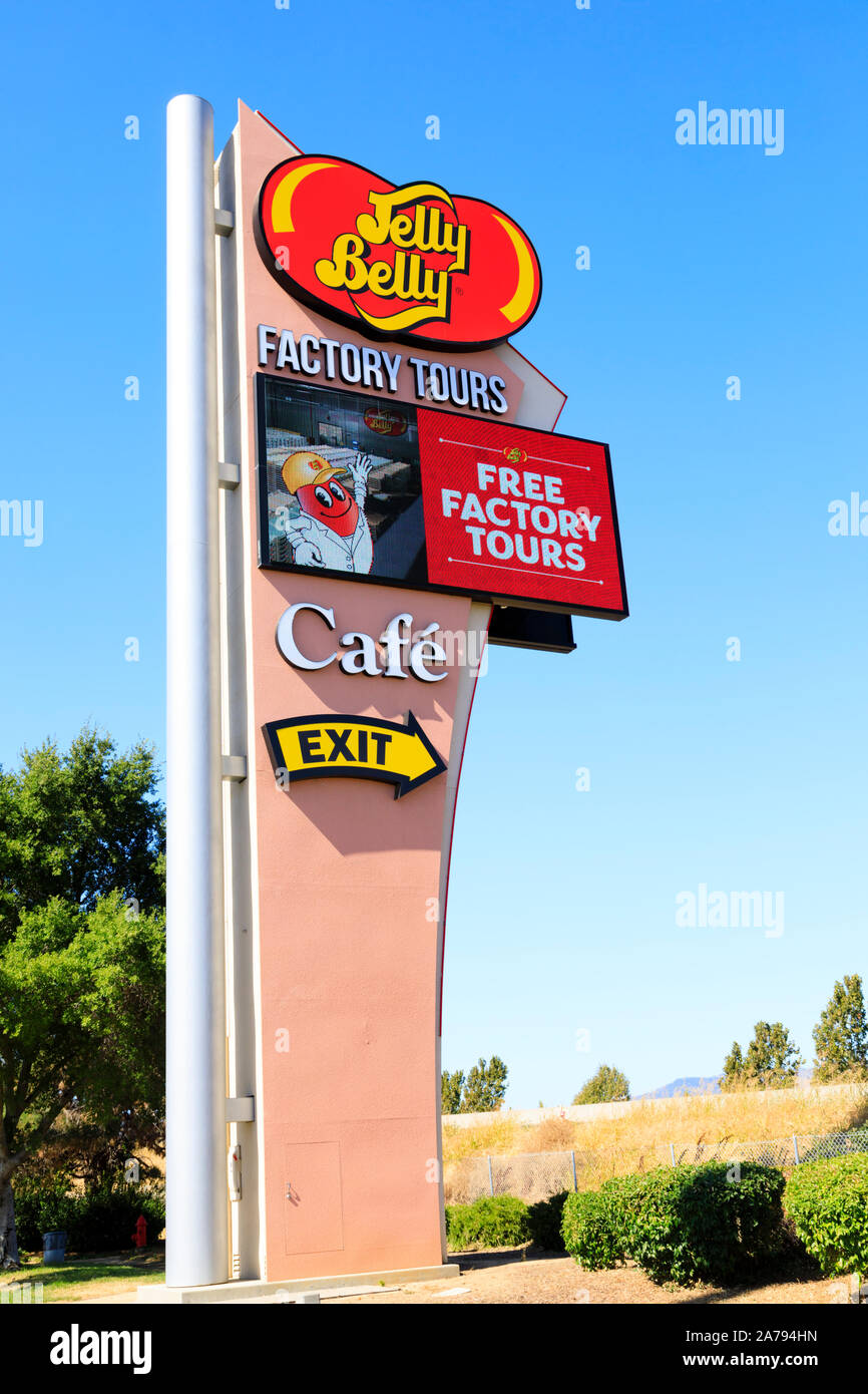 Sign post over I80 advertising the Jelly Belly Factory store and tours, Fairfield, California, United States of America Stock Photo