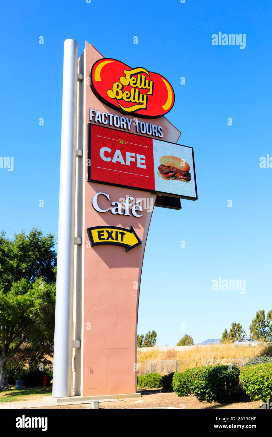 Sign post over I80 advertising the Jelly Belly Factory store and tours, Fairfield, California, United States of America Stock Photo