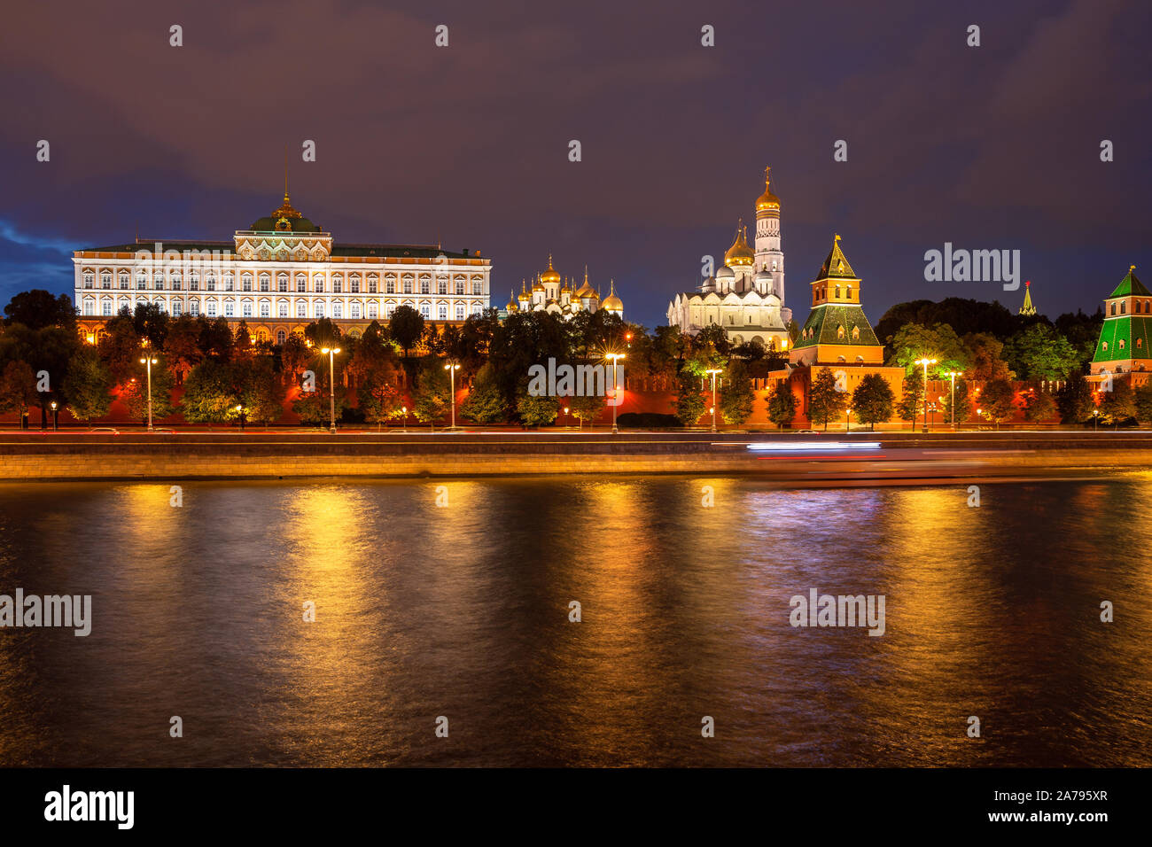 Night view of the Grand Kremlin Palace, Ivan the Great Belltower, and the Moskva River, Moscow, Russia Stock Photo