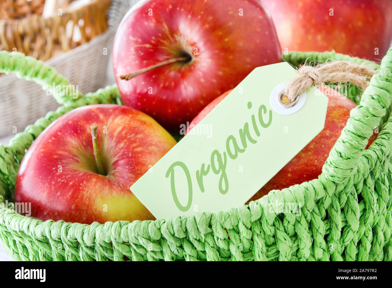 Apples and label in a basket Stock Photo