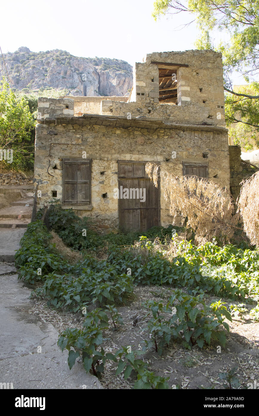 Crumbling building in a hidden village near Paleochora, Crete, Greece Stock Photo