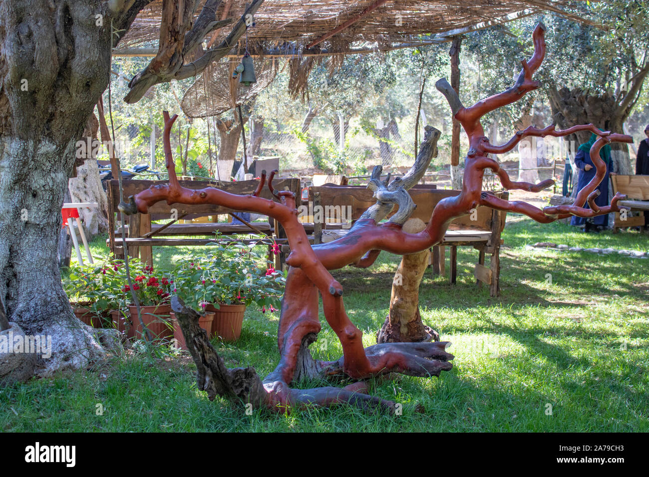 cut and varnished sculpture made from tree branches. Stock Photo