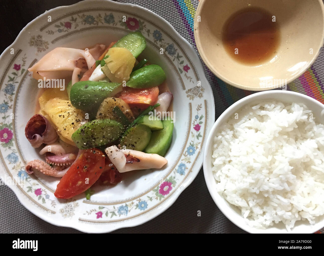 Seafood with rice and fish sauce (Nuoc Mam) Vietnamese style. Stock Photo