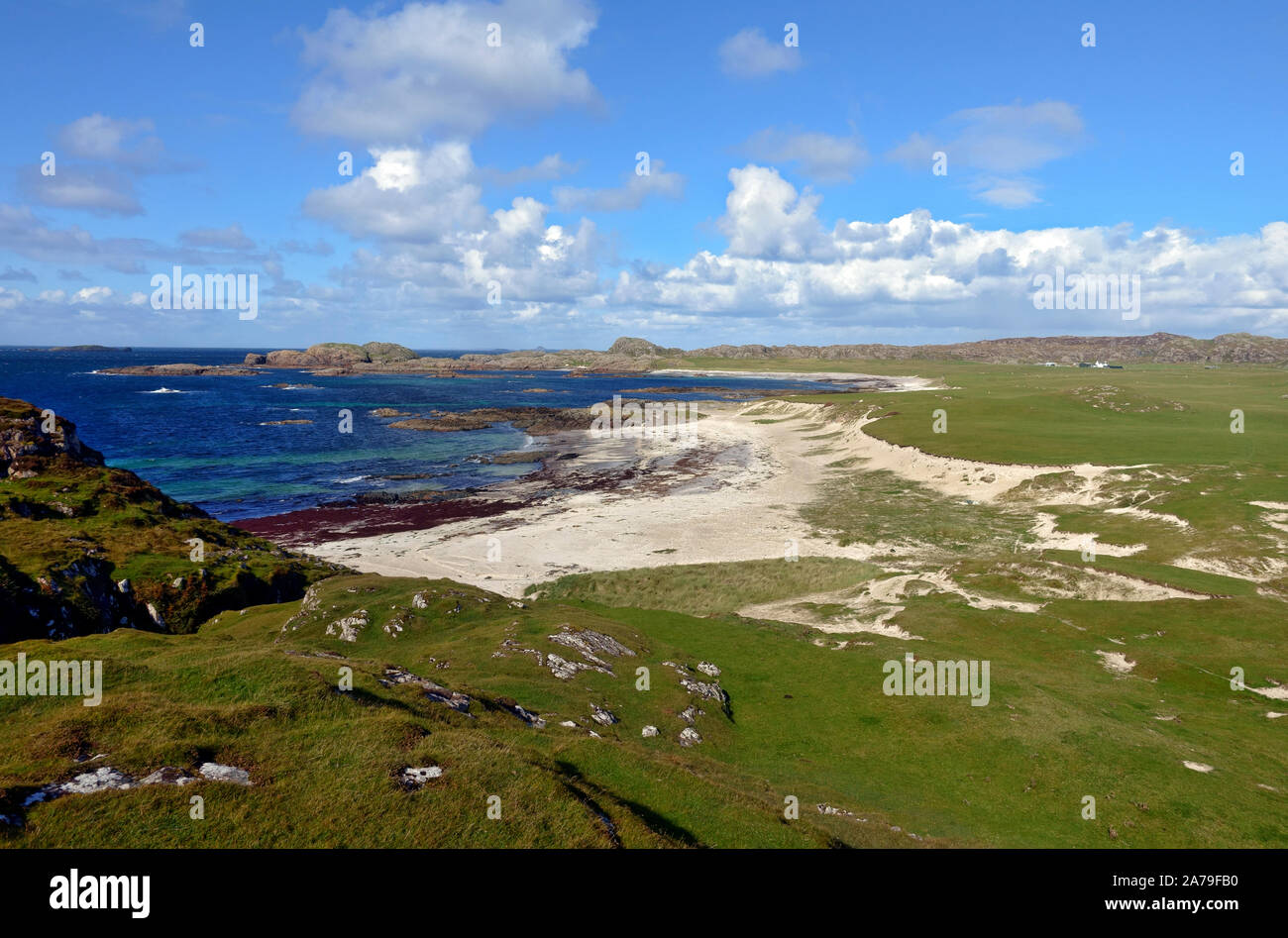 Iona, Scotland. The sandy beach of the 'Bay at the back of the Ocean' and also Iona golf course in the Inner Hebrides of Scotland Stock Photo