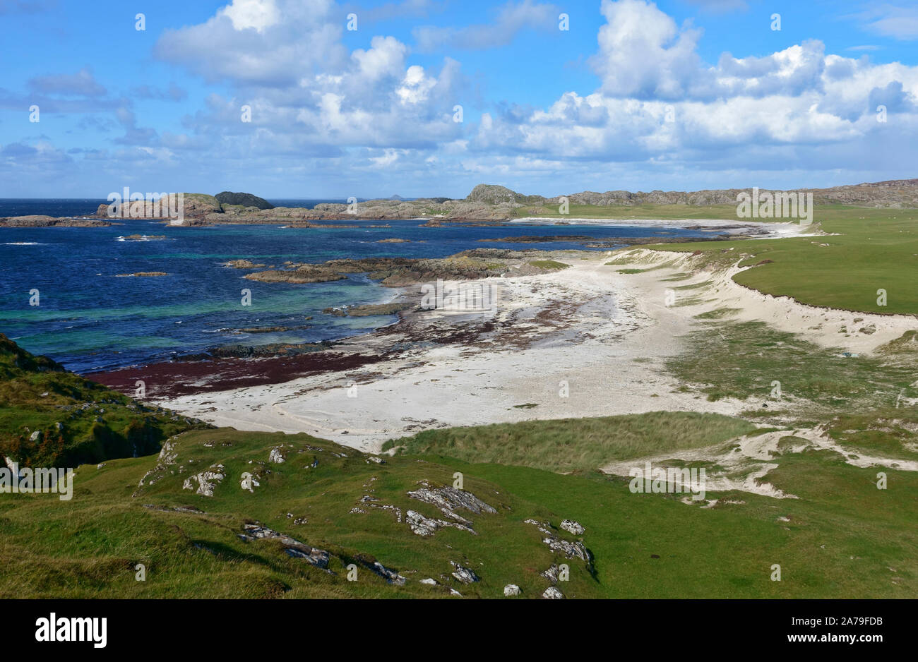 Iona, Scotland. The sandy beach of the 'Bay at the back of the Ocean' and also Iona golf course in the Inner Hebrides of Scotland Stock Photo