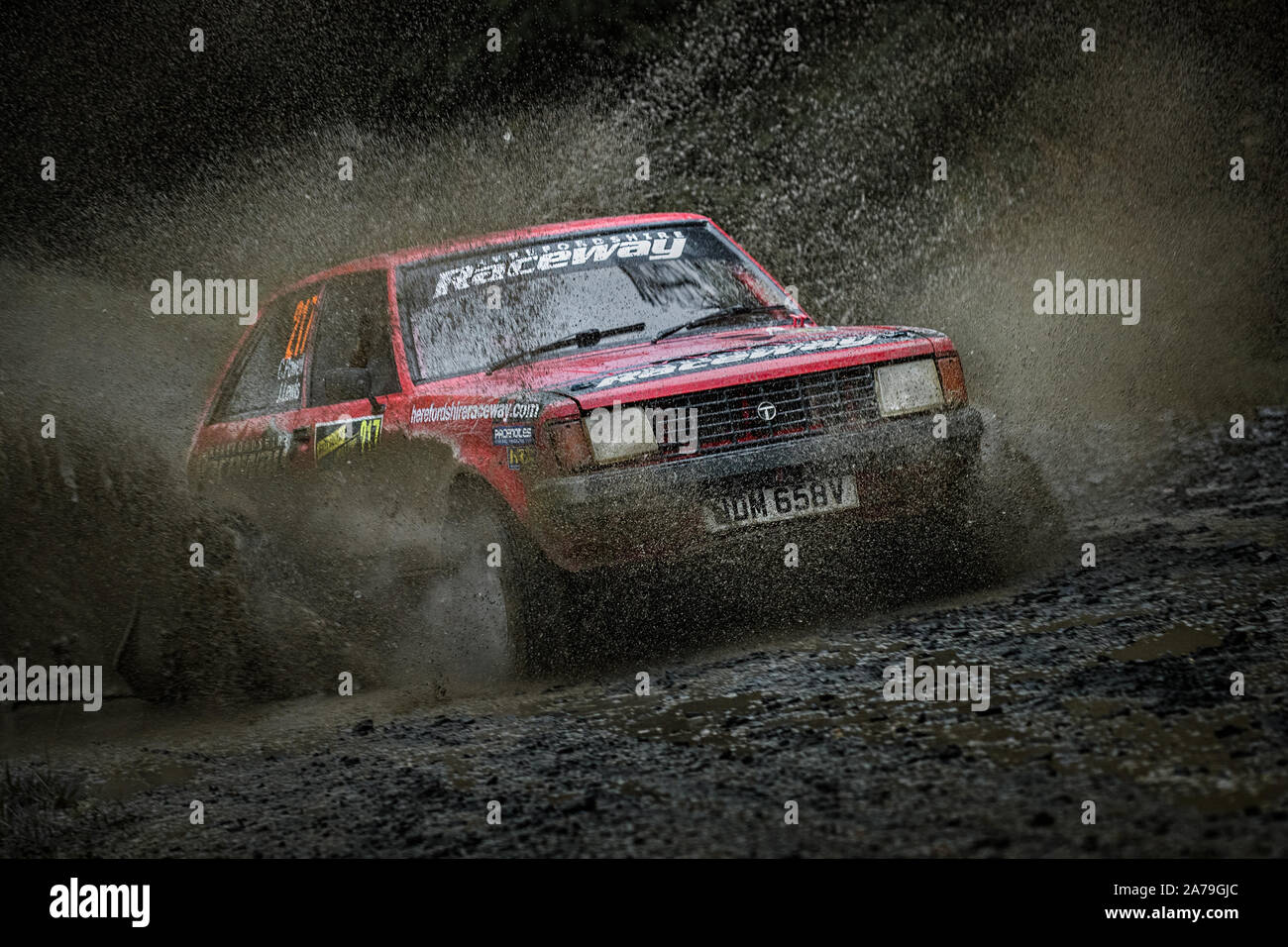 Chris Powell driving his Talbot Sunbeam through a watersplash in the 2019 WRC Wales Rally GB, Wales, UK Stock Photo