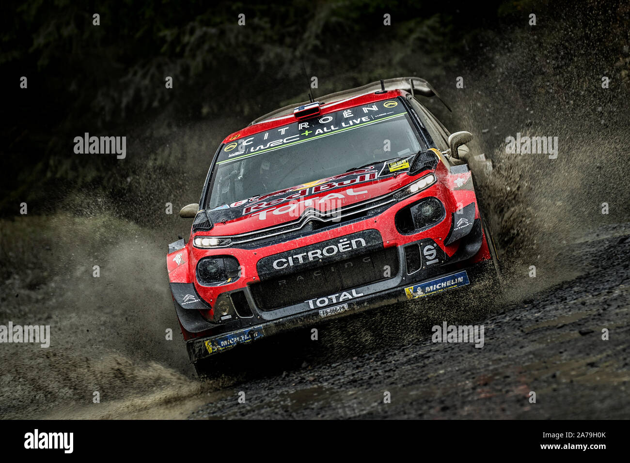 Esapekka Lappi driving through a watersplash for Citroen Total World Rally Team in the 2019 WRC Wales Rally GB in Wales, UK Stock Photo