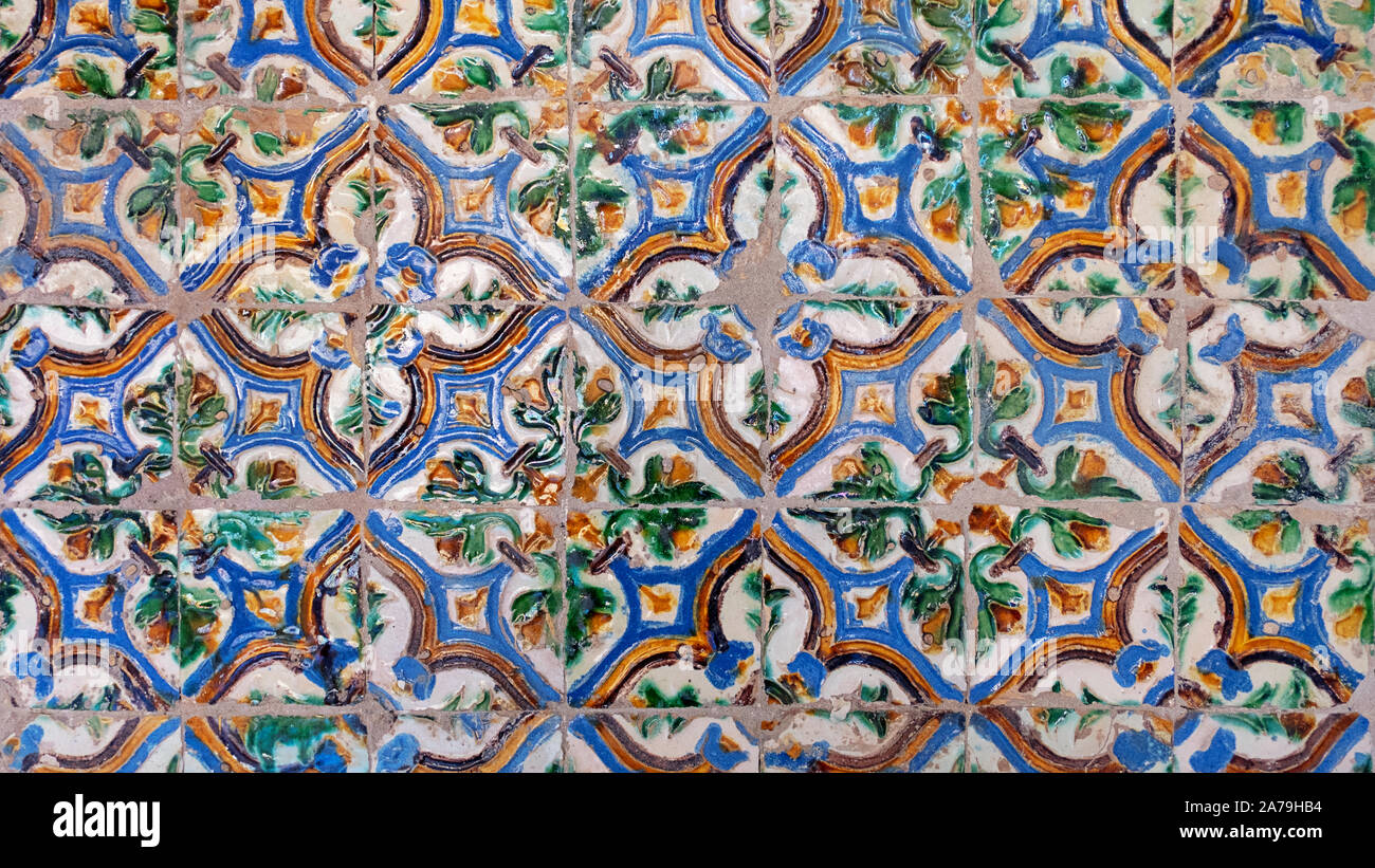 Old traditional arista tiles found in Seville, floral motifs forming