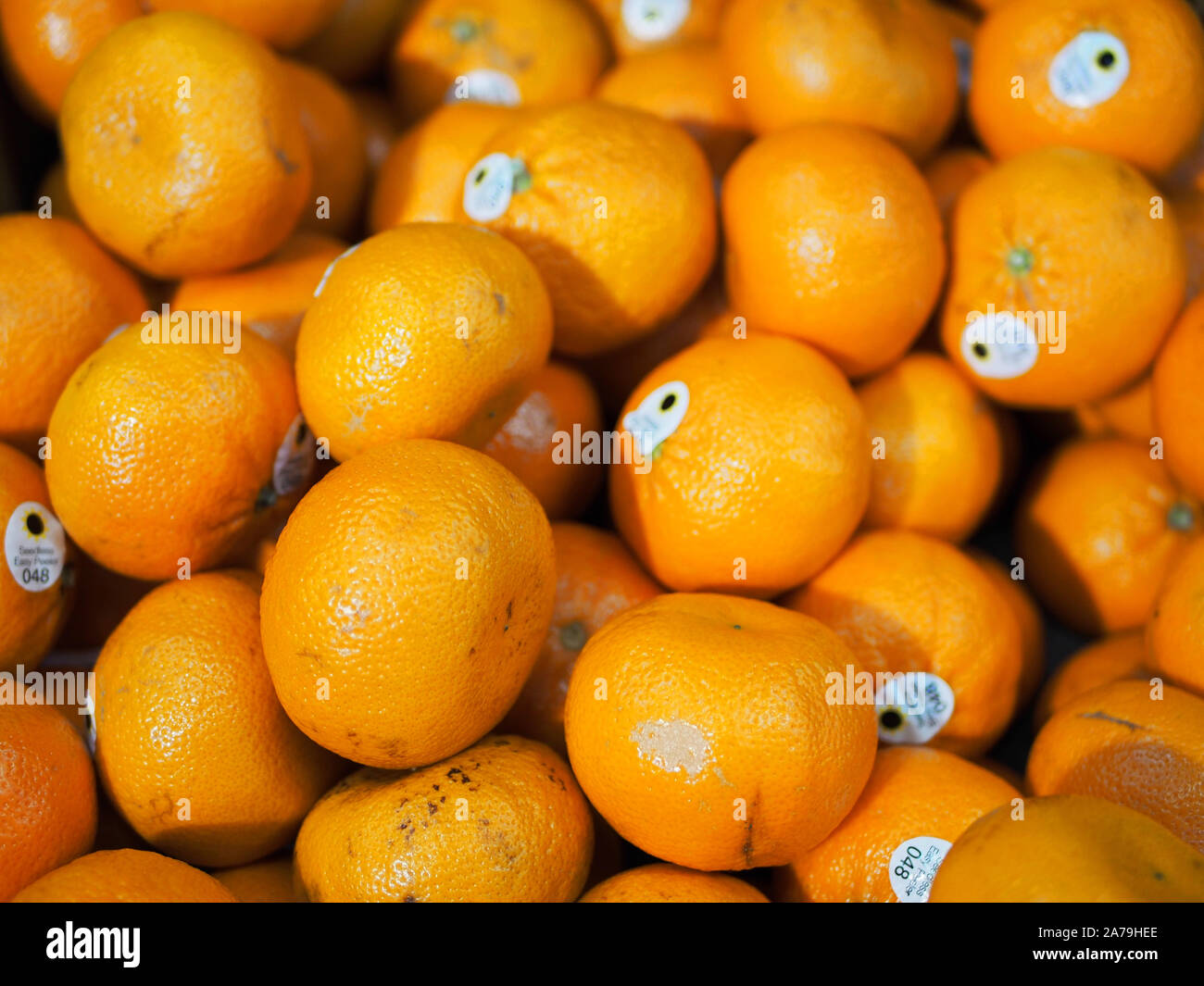 Pile of Easy Peeler Clementines in a Marks and Spencer Food Hall, UK