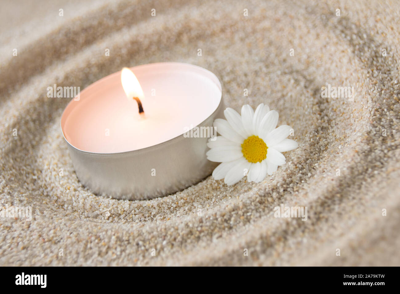 Candle and flower decoration Stock Photo - Alamy