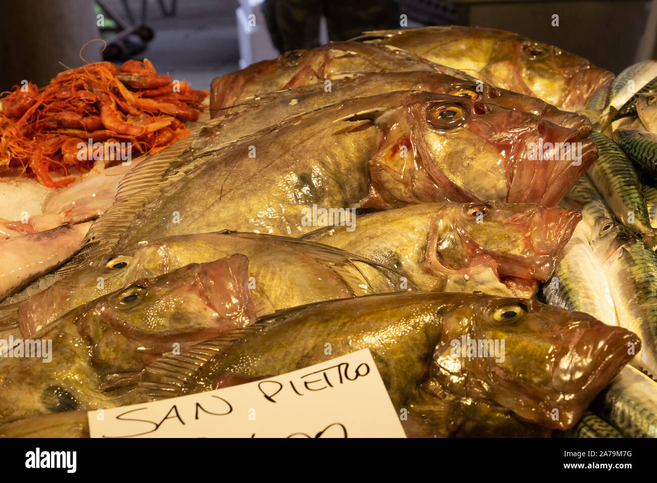 Traditional fresh wet fish display on ice at the traditional fish