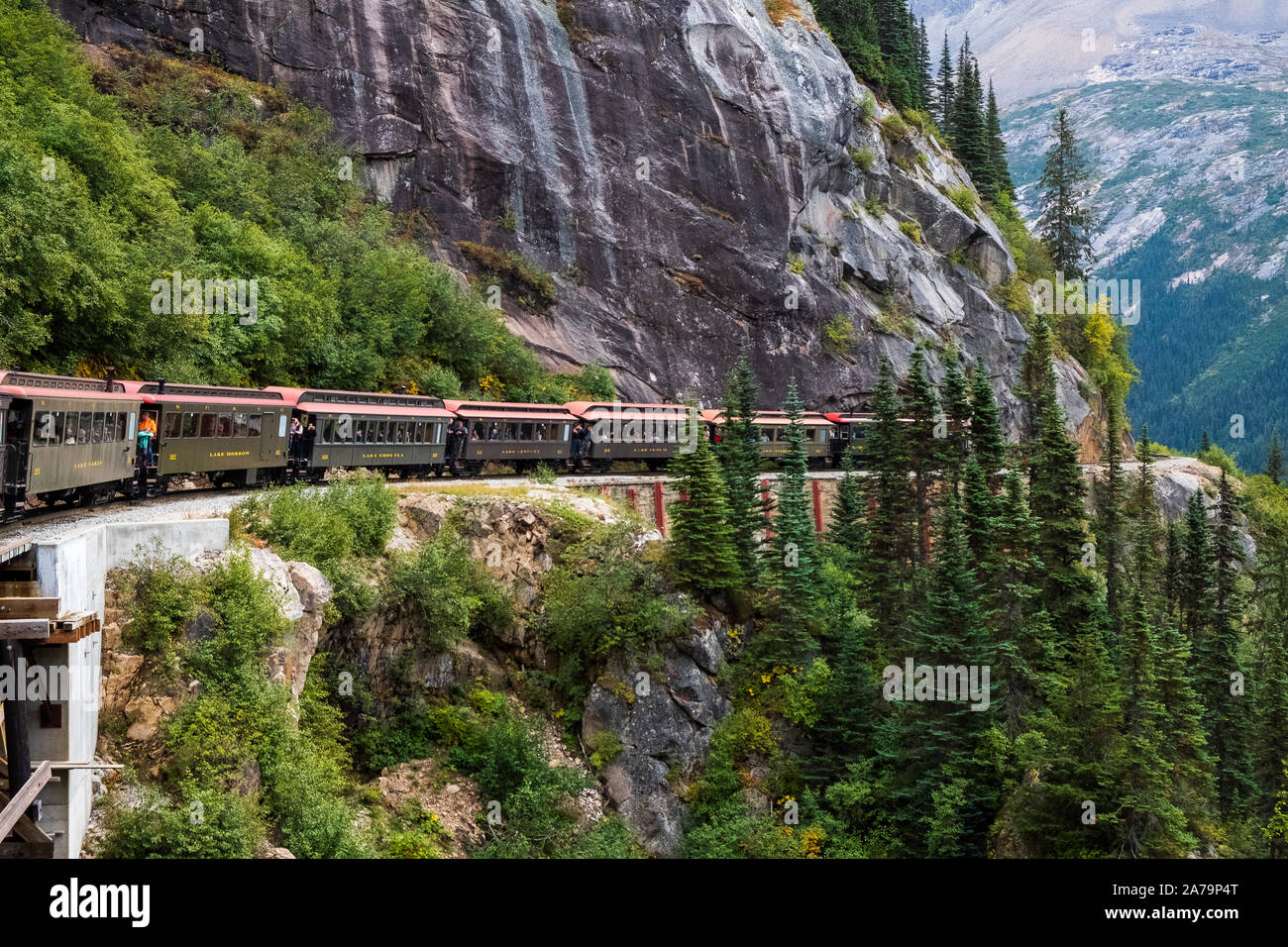 Breathtaking Alaska: White Pass train going through a scenic route Stock Photo