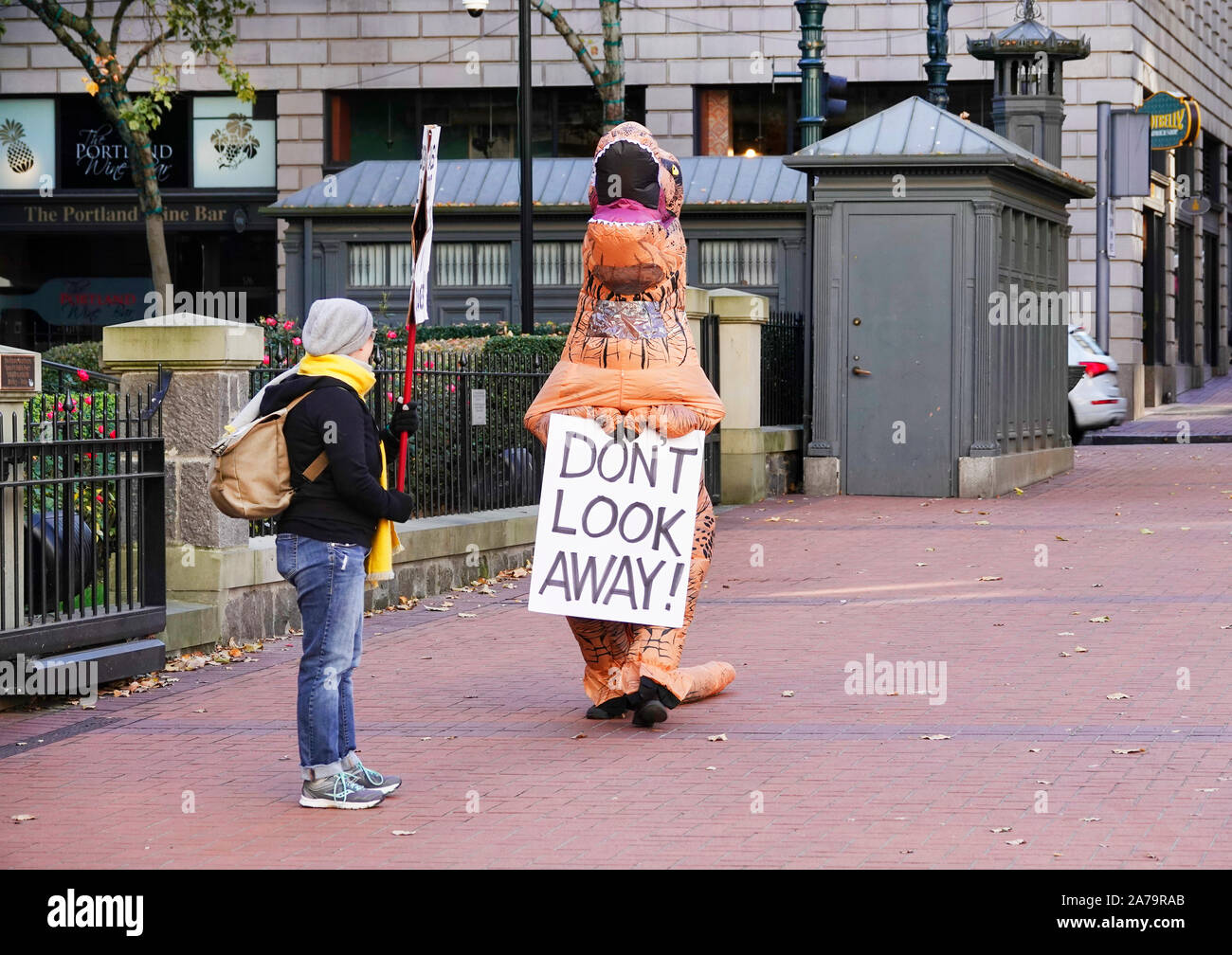 Students  protest the cruel treatment of animals at a rally in Pioneer Courthouse Square in downtown Portland, Oregon. Stock Photo