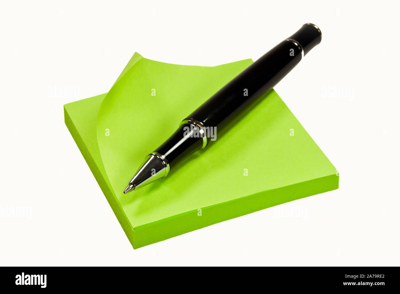 Green Notice block with ball pen Stock Photo - Alamy