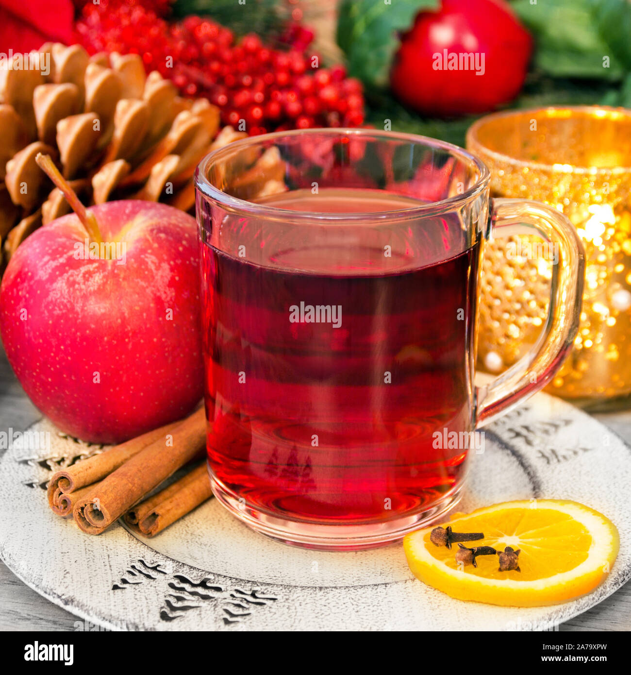 Mulled wine with spices as background Stock Photo