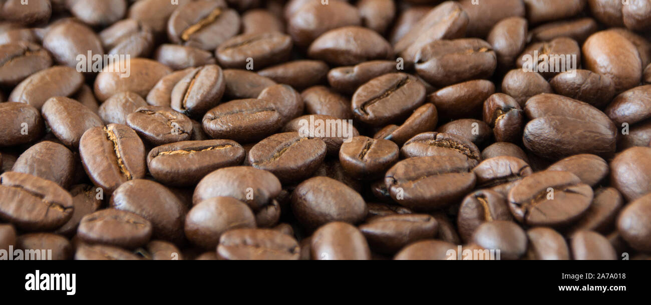 Roasted coffee beans as background Stock Photo - Alamy