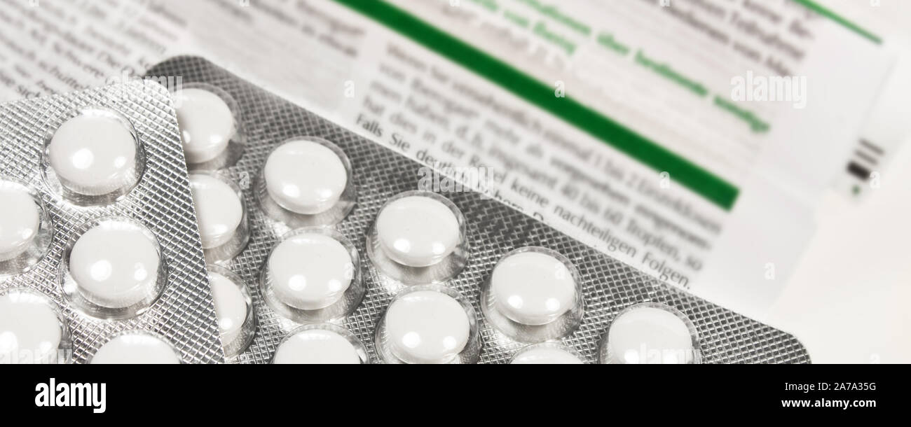 Medicine Tablets in blister on white background Stock Photo