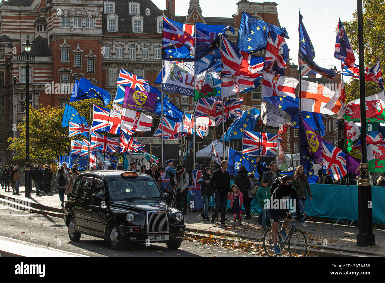 Pro Brexit and Anti-Brexit protesters on College Green opposite the Houses of Parliament during the Withdrawal Agreement Bill argument in  Westminster Stock Photo