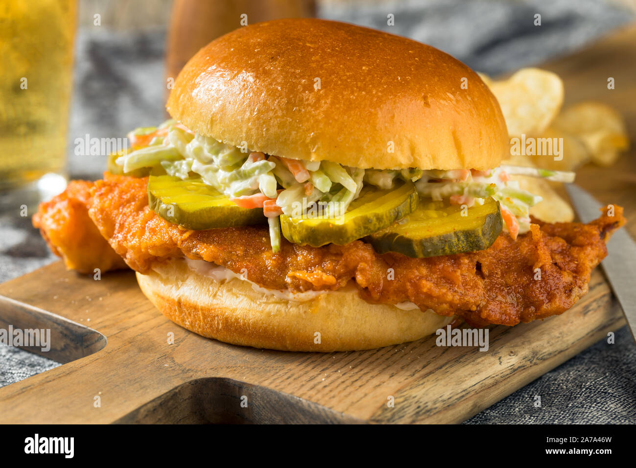 Homemade Nashville Hot Fish Sandwich with Chips Stock Photo Alamy