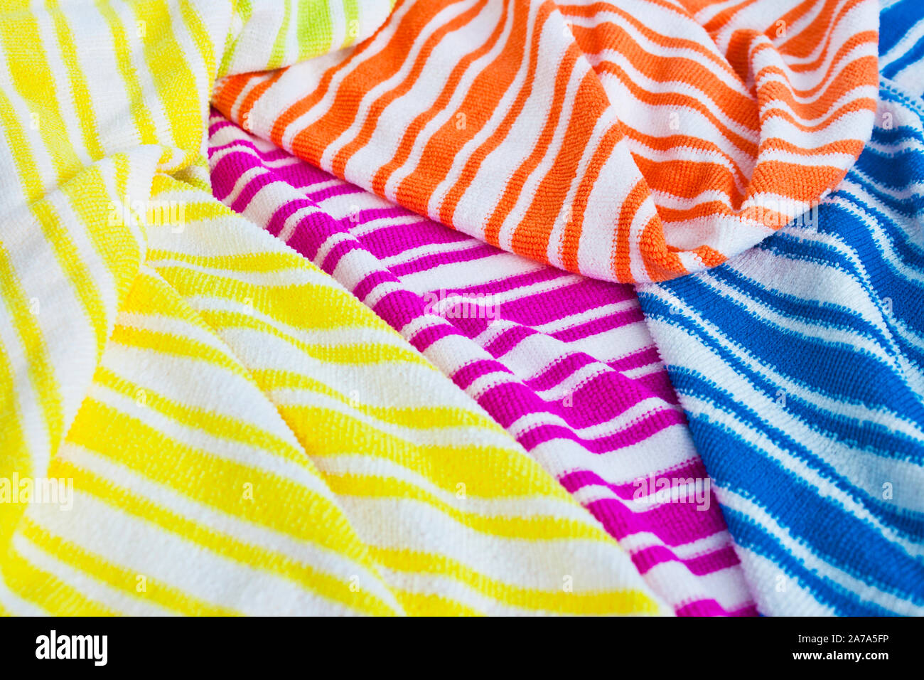 Coloured microfibre cloths as background Stock Photo