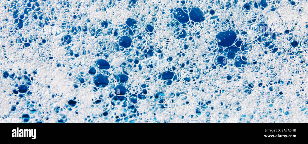 Foam bubbles with blue background Stock Photo